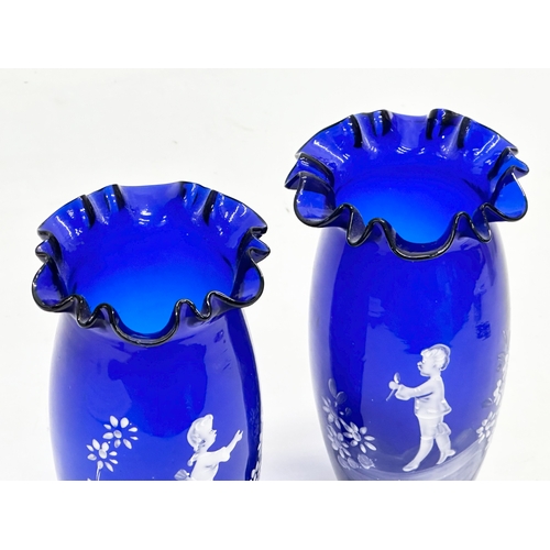 181 - A pair of 19th Century Victorian Bristol Blue, Mary Gregory vases with frilled rims. 9x18cm