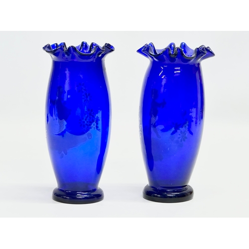 181 - A pair of 19th Century Victorian Bristol Blue, Mary Gregory vases with frilled rims. 9x18cm