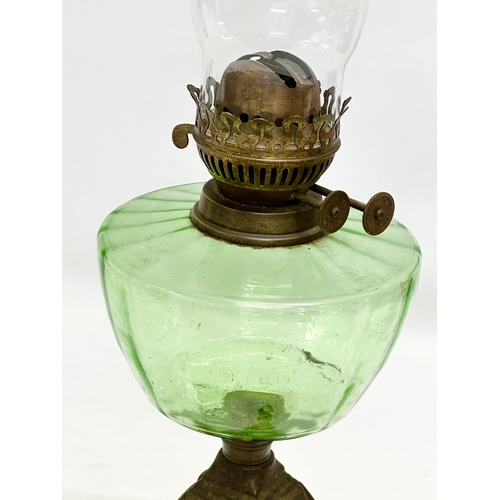 182 - A Late 19th Century Victorian double burner oil lamp, with glass bowl. 55cm