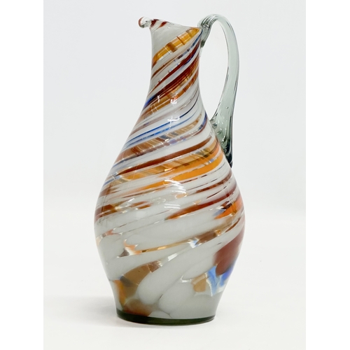 91 - A Mid 20th Century multicoloured hand blown jug. 1960. 22cm