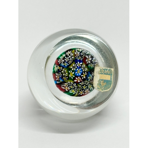 62 - A Murano Glass Millefiori paperweight. 6x5cm