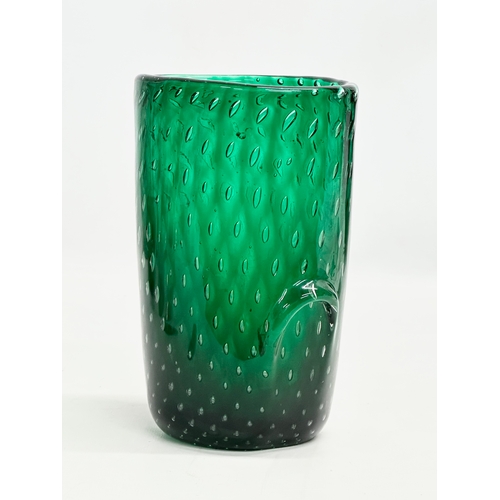 26 - Flavio Poli. A 1930’s Murano Glass emerald green vase. With controlled bubbles. Designed by Flavio P... 