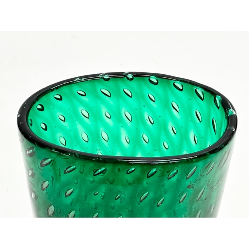 26 - Flavio Poli. A 1930’s Murano Glass emerald green vase. With controlled bubbles. Designed by Flavio P... 