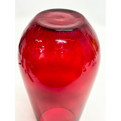 142 - A collection of 20th Century ruby glass.