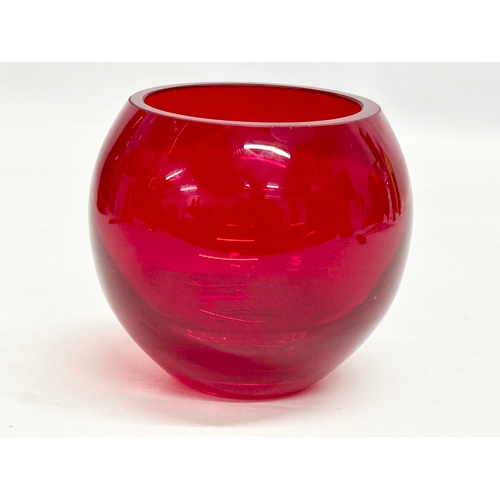 142 - A collection of 20th Century ruby glass.