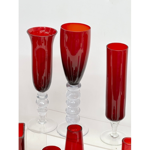 142 - A collection of 20th Century ruby glass.