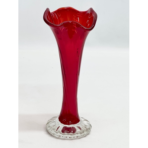 142 - A collection of 20th Century ruby glass.