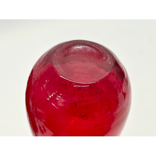 142 - A collection of 20th Century ruby glass.