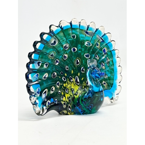 144 - A Late 20th Century art glass peacock. 20x16cm