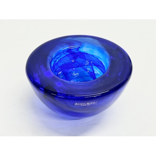 151 - Anna Ehrner. A Swedish cobalt blue glass bowl designed by Anna Ehrner for Kosta Boda. 11x6cm