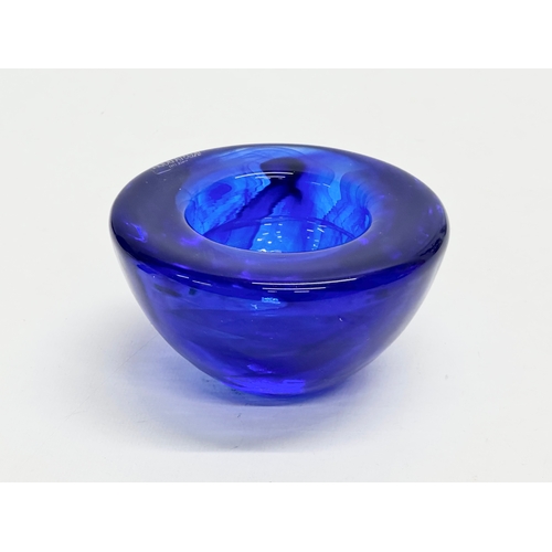 151 - Anna Ehrner. A Swedish cobalt blue glass bowl designed by Anna Ehrner for Kosta Boda. 11x6cm