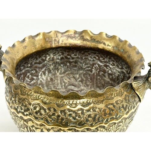 103 - A Late 19th Century Indian brass engraved jardiniere/planter. 25x18.5x14.5cm.