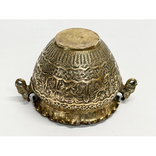 103 - A Late 19th Century Indian brass engraved jardiniere/planter. 25x18.5x14.5cm.