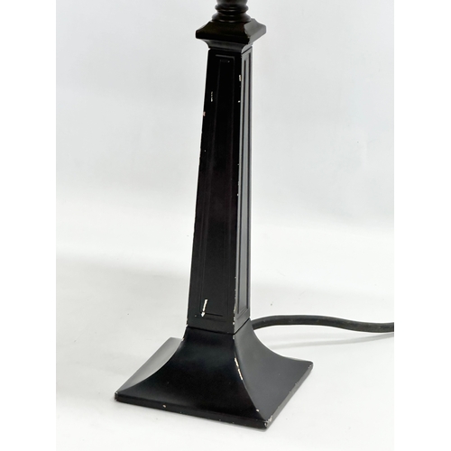 123 - A tall Tiffany style table lamp. 26x26x56cm