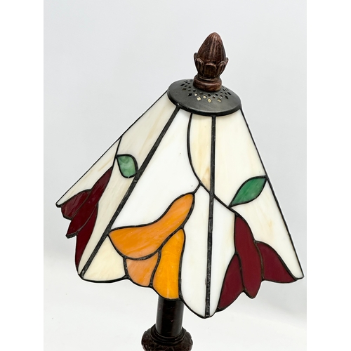 124 - A tall Tiffany style table lamp. 62cm