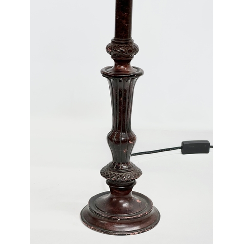 124 - A tall Tiffany style table lamp. 62cm