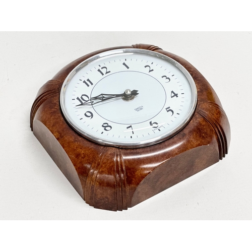 211 - A Smiths Sectric Art Deco wall clock. 17x17x6.5cm