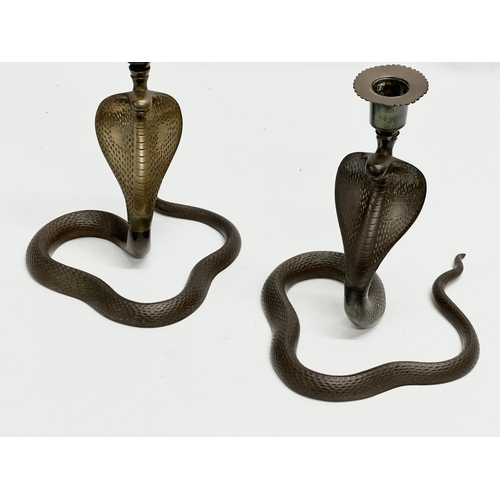 192 - A pair of large Early 20th Century brass cobra candlesticks/candleholders. 18x23x21cm