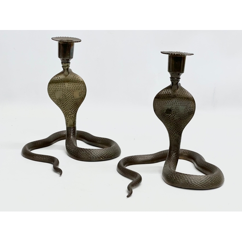 192 - A pair of large Early 20th Century brass cobra candlesticks/candleholders. 18x23x21cm