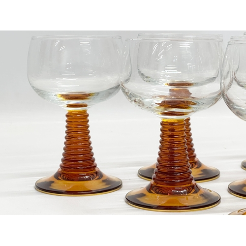 244 - A set of 6 Mid 20th Century French glass rummers, with amber beehive stems. 9x14cm