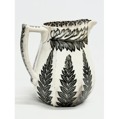 391 - Two 19th Century pottery jug. A John Marshall Bo’ness ‘Fern Leaf’ jug 16x13x16cm. A Mid 19th Century... 