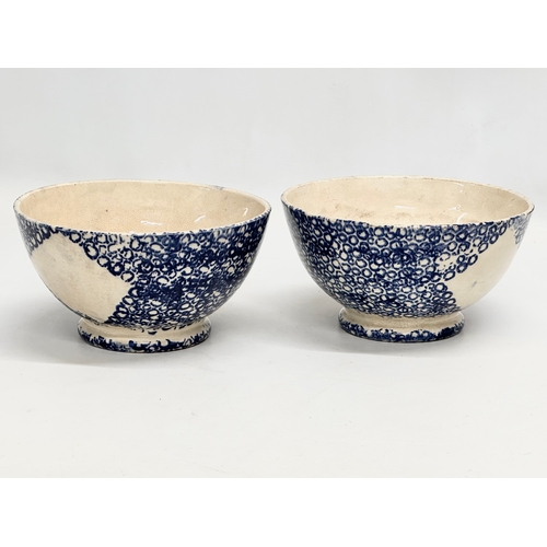 196 - A pair of 19th Century blue and white sponge ware bowls. 18x9.5cm