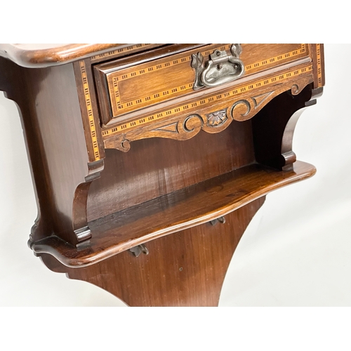 248 - A Late 19th Century Victorian inlaid mahogany wall bracket with drawer. 41x16x51cm