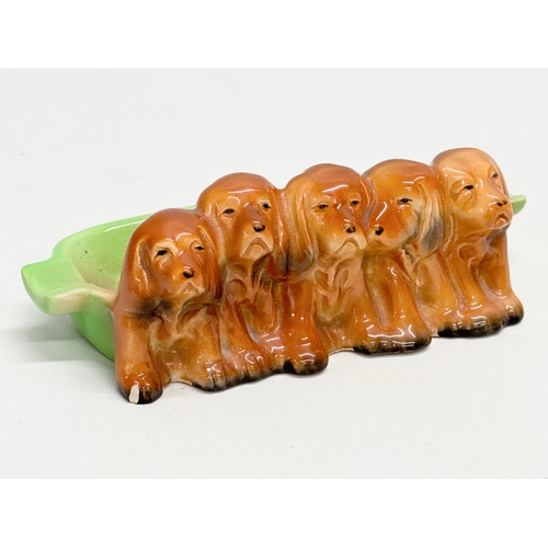 439 - A Beswick Pottery Spaniel Puppies ashtray. 15x7cm