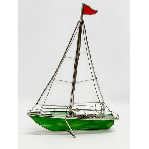 440 - A stained glass model sailboat. 26x36cm