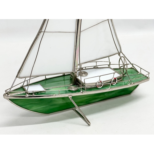 440 - A stained glass model sailboat. 26x36cm