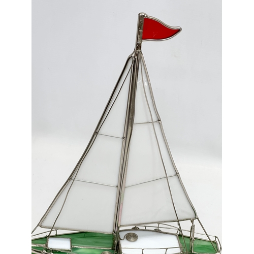 440 - A stained glass model sailboat. 26x36cm