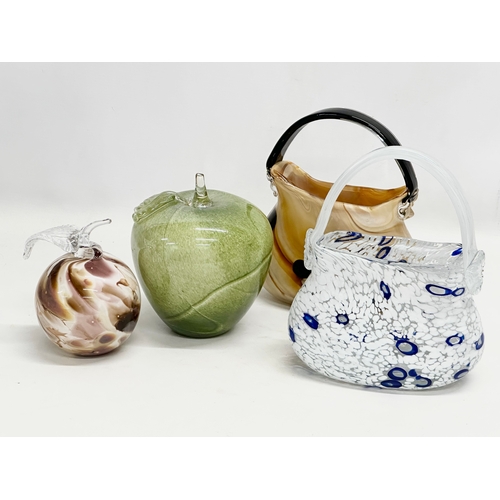 441 - A collection of art glass apples and purses. Large green apple 14x17cm. Purses 18x22cm