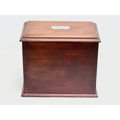 251 - An Early 20th Century mahogany smokers cabinet/humidor. With sterling silver presentation mount. 32.... 