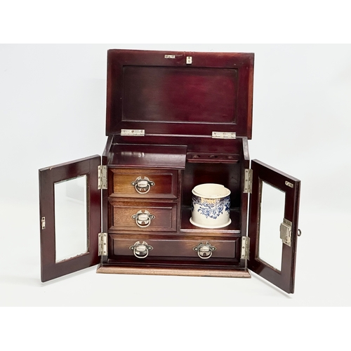 251 - An Early 20th Century mahogany smokers cabinet/humidor. With sterling silver presentation mount. 32.... 