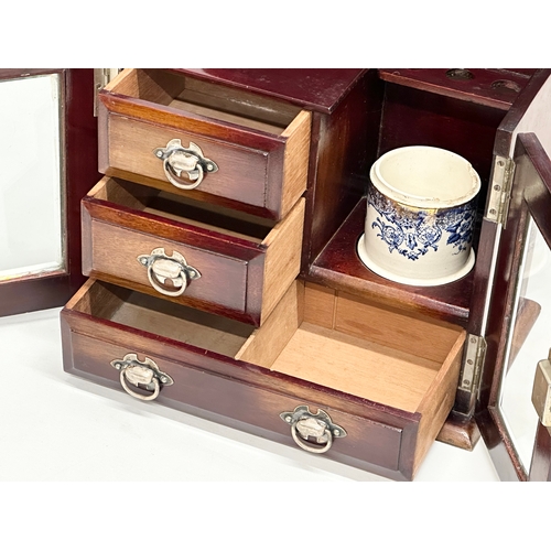 251 - An Early 20th Century mahogany smokers cabinet/humidor. With sterling silver presentation mount. 32.... 