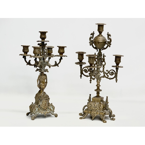 253 - 2 large brass candelabras. Late 19th and Early 20th Century. 22x41cm. 17x38cm