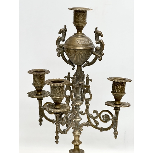 253 - 2 large brass candelabras. Late 19th and Early 20th Century. 22x41cm. 17x38cm