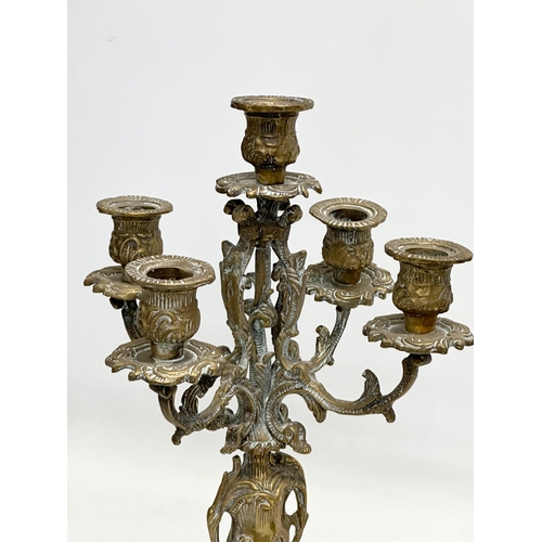 253 - 2 large brass candelabras. Late 19th and Early 20th Century. 22x41cm. 17x38cm