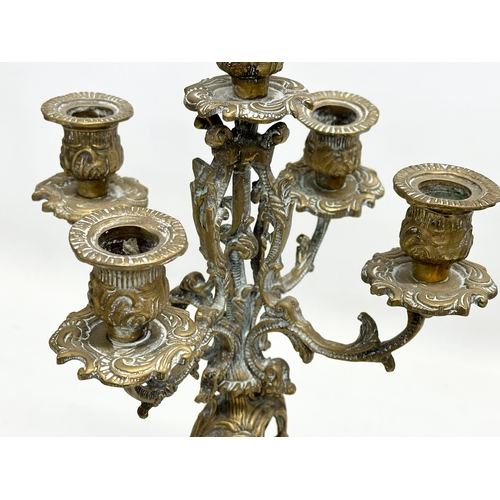 253 - 2 large brass candelabras. Late 19th and Early 20th Century. 22x41cm. 17x38cm