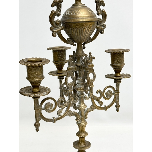 253 - 2 large brass candelabras. Late 19th and Early 20th Century. 22x41cm. 17x38cm