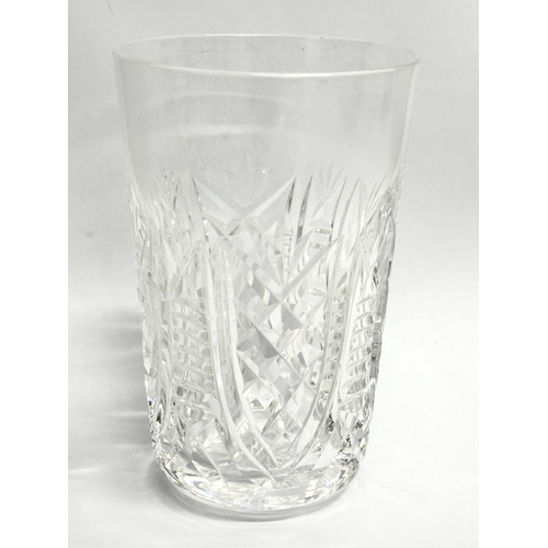 176 - A set of 9 Waterford Crystal ‘Clare’ whiskey glasses. 7.5x11.5cm.