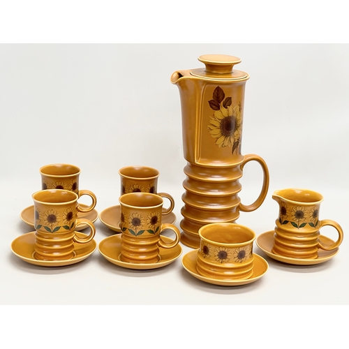 226 - A Mid Century Carlton Ware ‘Sunflower’ coffee service. 13 piece. Coffee pot 32cm 4 cups, 6 saucers, ... 