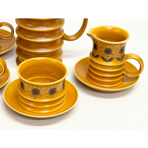 226 - A Mid Century Carlton Ware ‘Sunflower’ coffee service. 13 piece. Coffee pot 32cm 4 cups, 6 saucers, ... 