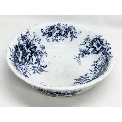 380 - A large Late 19th Century ‘Gardenia’ wash bowl. R.C & Co. V.P. 38x12cm