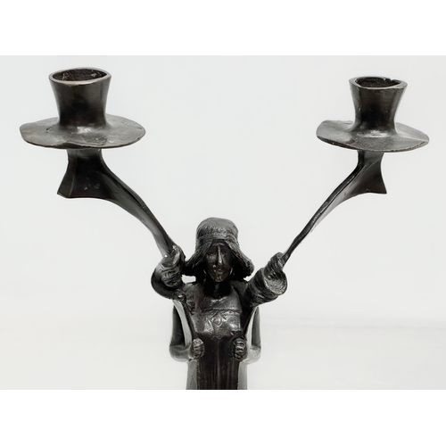 31 - Jules Moigniez (1835-1894) a pair of signed bronze Art Nouveau candelabras. In the manner of Jules M... 