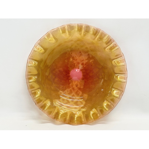 58 - A Late 19th Century threaded glass plate by Nicholas Lutz. 21cm.