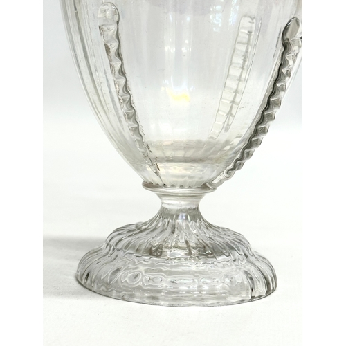 83 - An Early 20th Century iridescent glass vase. 18.5cm.