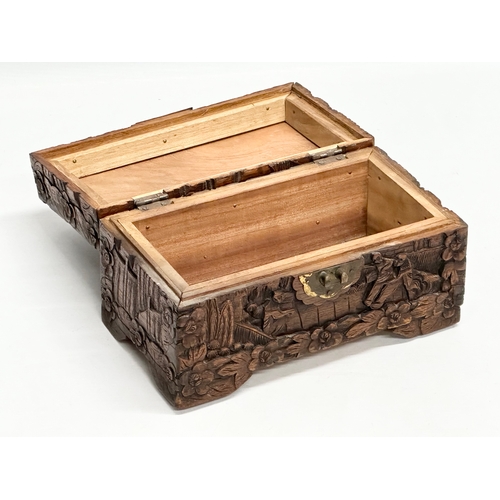 73 - A Late 19th Century Chinese carved camphor wood jewellery box. 24x13x13cm.