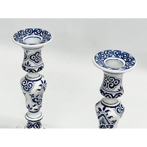 79 - A pair of 19th Century French delft ware candlesticks by Gien. Circa 1871-1875. 12.5x12.5x23cm.