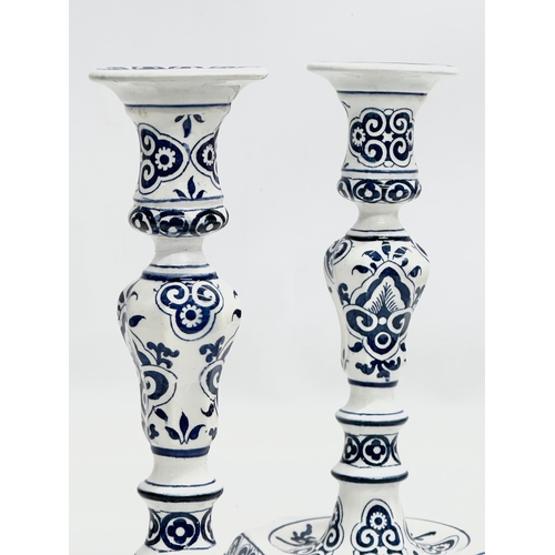 79 - A pair of 19th Century French delft ware candlesticks by Gien. Circa 1871-1875. 12.5x12.5x23cm.